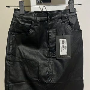 Black coated mini skirt